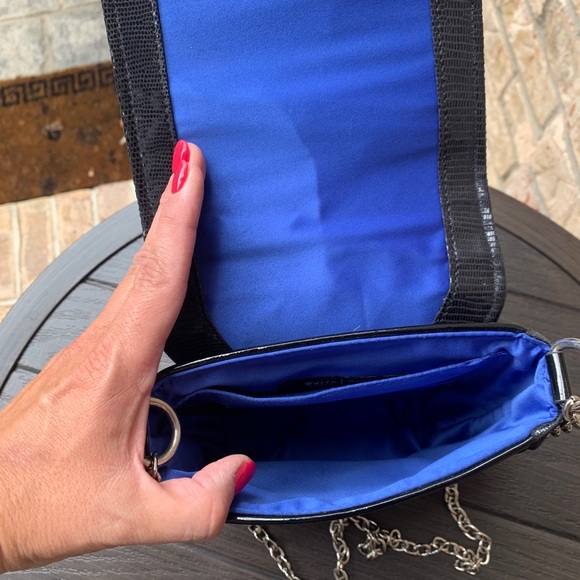 Zebra and black crossbody with silver chain strap. New condition. - Picture 4 of 6